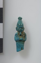 Petite figurine d'Osiris (les pieds manquent) en terre bleue émaillée