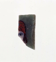 Fragment of a plaque with half of a face