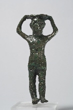 Figurine, probably a mirror handle