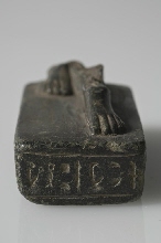 Fragment of the base of a Sekhmet statue with inscription