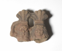Fragment of a figurine of Bes