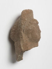 Head of a figurine of a woman