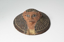 Lid of a canopic jar with decorations and hieroglyphic inscription