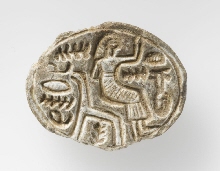 Kauroïde met "anra" inscriptie