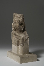 Fragment of a sitting deity with ram's head, with inscription