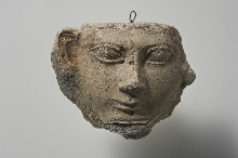 Mask with traces of polychrome paint and gold leaf on the right ear
