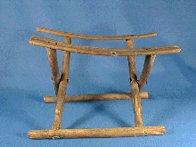 Folding stool with legs ending in duck heads