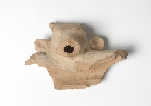 Fragment of the rim of a vase, with spout in the shape of a bull's head 