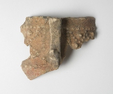 Fragment of pottery decorated with barbotine