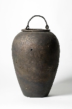 Ovoid vase with mobile handle