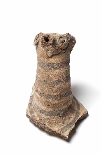 Fragment of a vase (?) decorated with the head of an animal