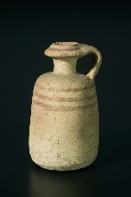 Decorated jar with handle