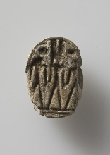 Scarab with Amun-Ra and two falcon-headed deities