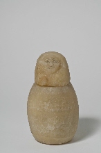 Canopic jar with a lid in the shape of a human head