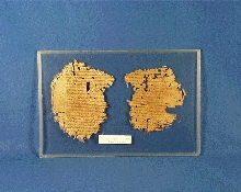Fragments of two pages from a codex (bound book) containing Homer’s Iliad, in Greek