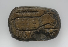 Oval plaque with hippopotamus and Hathor sistrum