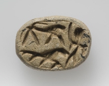 Scarab with hunting scene
