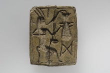 Fish-shaped rectangular plaque with representation of Bes