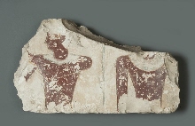 Fragment of a relief: two royal figures, back to back