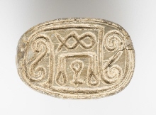 Scarab with spirals and hieroglyphs