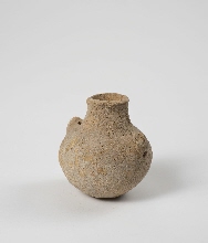 Vase with round body and handle