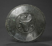 Umbo en bronze