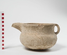 Vessel with spout and handle