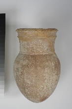 Vessel with oval body and high wide neck