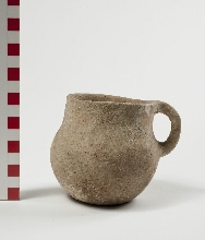 Pitcher with round body and handle