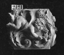 Decorative component with putto
