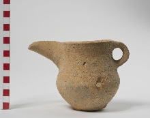 Pitcher with round body and handle