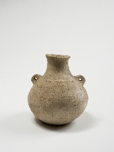 Vase with round body and handles
