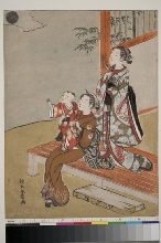 Deux femmes et un enfant regardant la lune