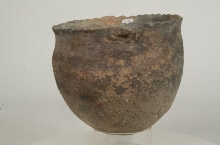 Vase with buttons and toothed rim