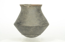 Carinated vase with flaring rim and human remains