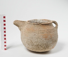 Vessel with spout and handle