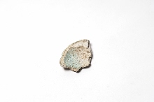 Fragment of a blue glazed object
