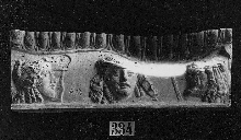 Element of a frieze with masks