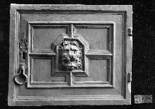Furniture door with lion's muffle