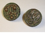 Ornamental buttons of a scabbard