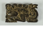 Decorative belt plaque (daigou) with a man holding a camel
