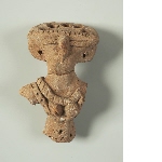 Fragment of a votive statuette of a naked woman