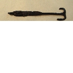 Key with remains of textile