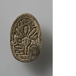 Scarab with the representation of a Hathor-head and 'anra'-signs