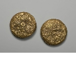 Pair of pendants representing a battle scene