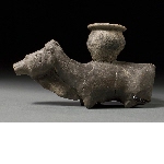 Figurine of an animal with small beaker attached on top