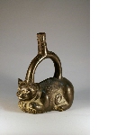 Vase in the shape of a lying feline