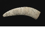 Fragment of a magic wand with engraved decoration