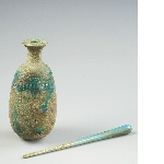 Small glazed vase with inscription