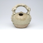 Beige spherical lime pot with handle